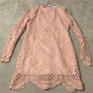 Large pink knit dress with long sleeves